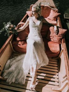 Bohemian bride in a boat