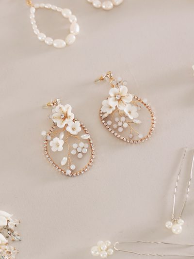 Gold hoop earrings with flowers