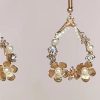 Close up large chandelier earrings