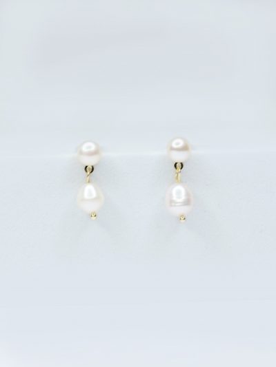 Natural pearl drop studs for pierced ears.
