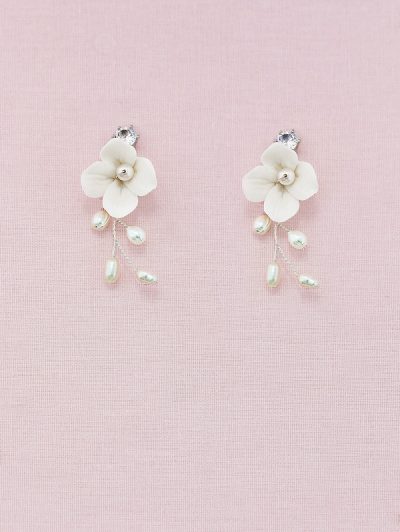 Earrings with single flower and pearls.