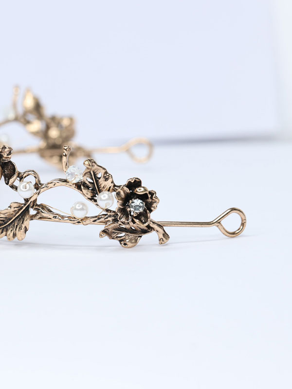 Black and gold tiara with hair pin loops