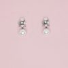 Delicate pearl drop boho earrings for relaxed wedding theme.
