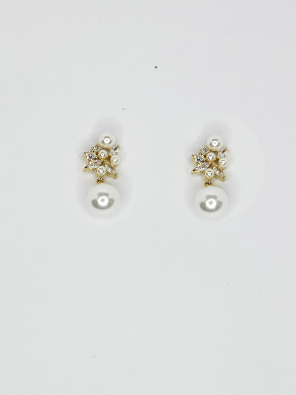 gold earrings with hanging round pearl.