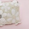 Clutch purse with flower detail
