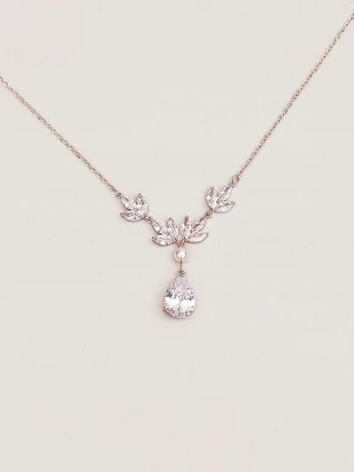 Rose gold crystal drop wedding necklace with pear-shaped pendant and marquise accents.