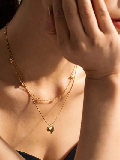 Gold double chain necklace with love heart