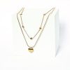 Gold double chain necklace for ladies.