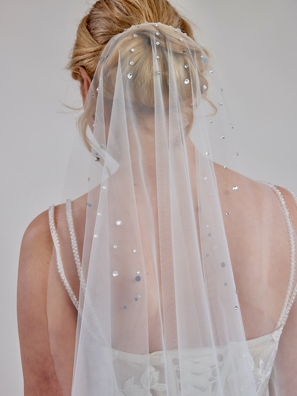 Simple wedding veils with diamonties.