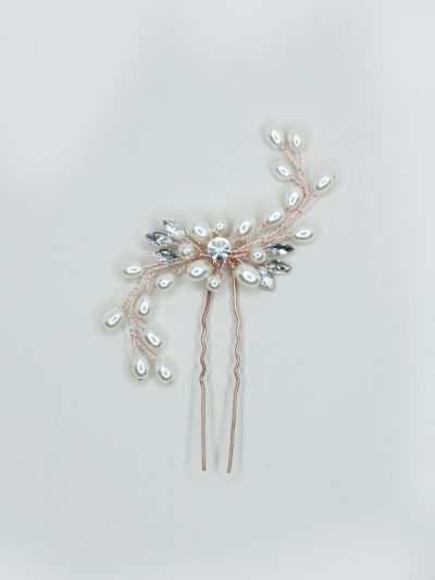 Rose gold hair pins for wedding event.